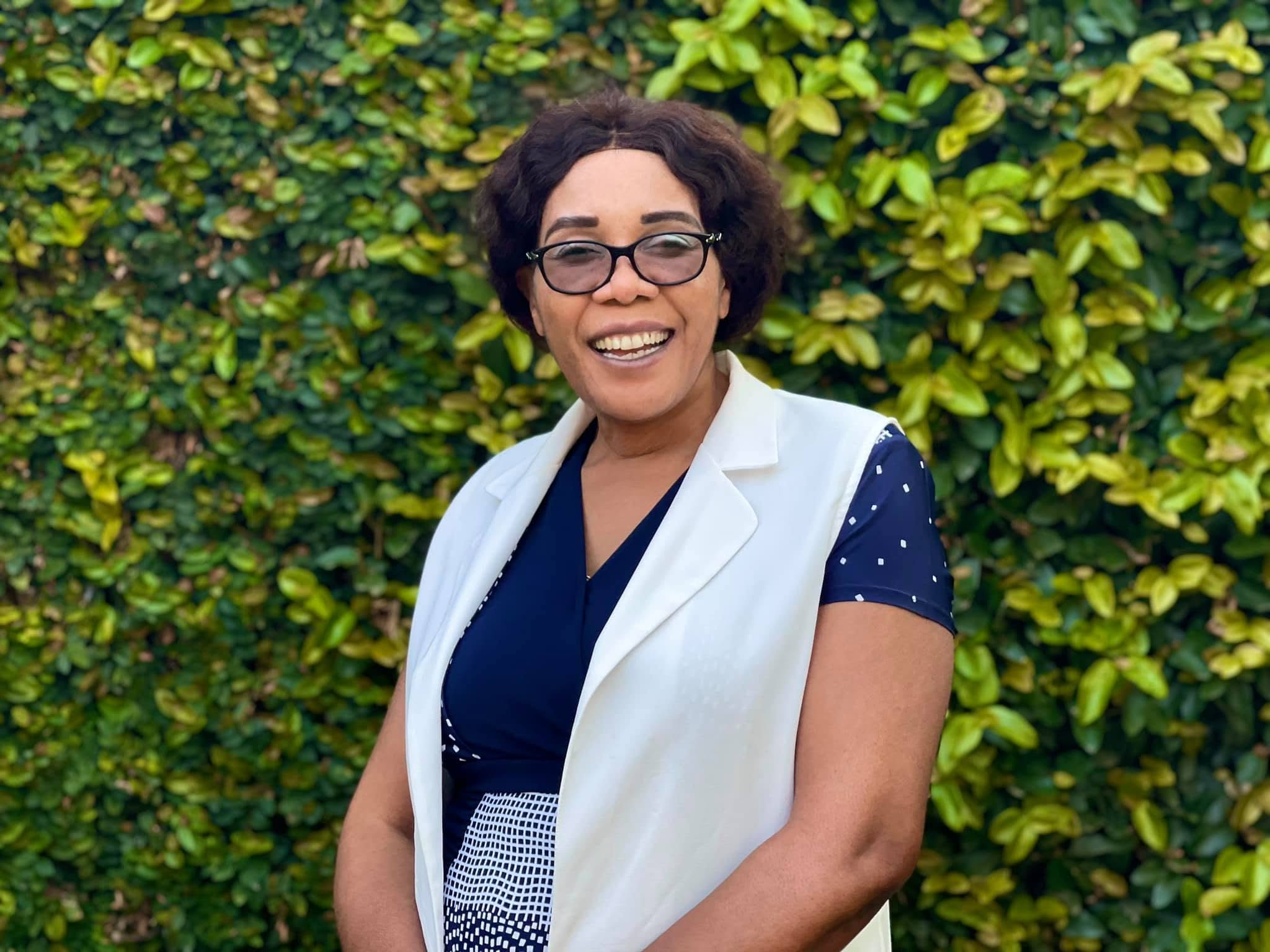 Dr. Kanyenze at menopause talk — receiving recognition